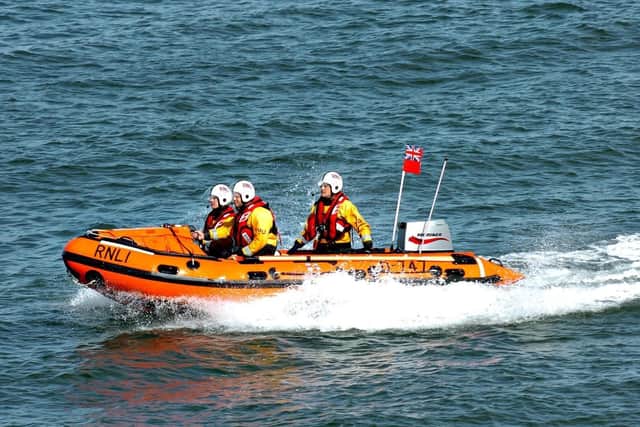 Sunderland RNLI volunteers were called out to rescue three teenagers who had become cut off by the tide in Roker.