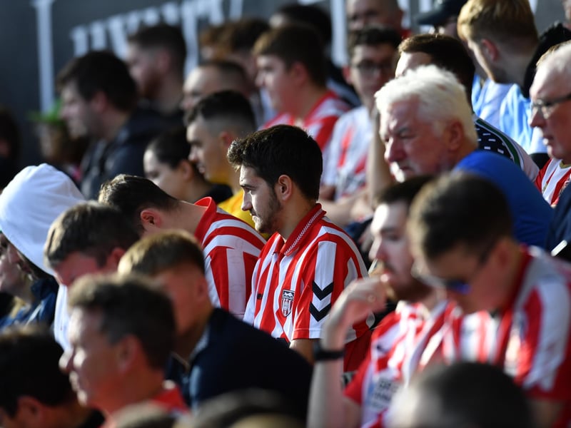 Sunderland supporters in action away from home in Wales at the Liberty Stadium against Swansea City in the Championship.