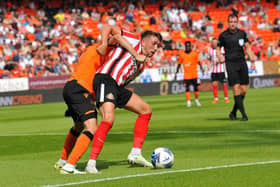 Dan Neil playing for Sunderland against Dundee United.
