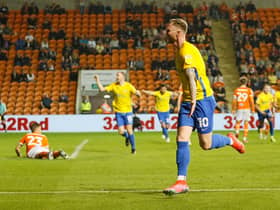 Aiden O'Brien celebrates his second goal at Bloomfield Road