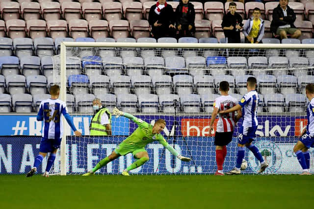 Nathan Broadhead scores his first Sunderland goal at the DW Stadium