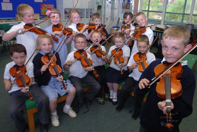 Year 2 pupils at Thorney Close Primary were enjoying a violin lesson when this 2010 photo was taken.
