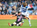 LONDON, ENGLAND - MARCH 20: Jack Marriott of Peterborough United is challenged by Dion Sanderson of Queens Park Rangers during the Sky Bet Championship match between Queens Park Rangers and Peterborough United at The Kiyan Prince Foundation Stadium on March 20, 2022 in London, England. (Photo by Alex Davidson/Getty Images)