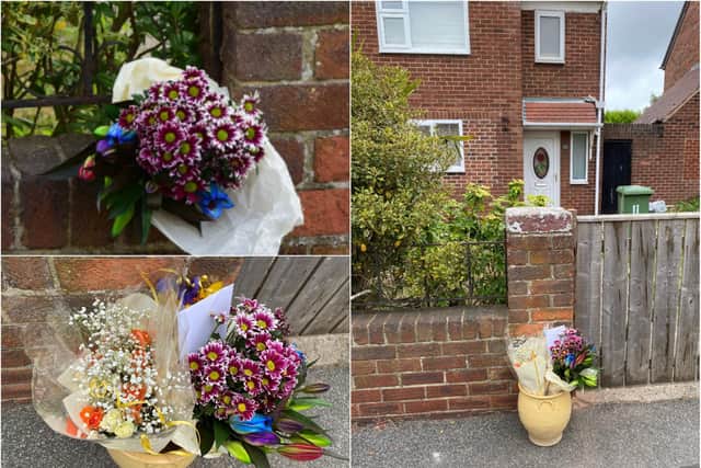 Flowers left at the scene of a suspected murder on Park Avenue in Silksworth
