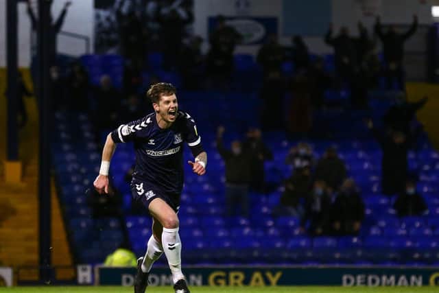 SOUTHEND, ENGLAND - DECEMBER 15: Greg Halford of Southend United celebrates his team's third goal during the Sky Bet League Two match between Southend United and Grimsby Town at Roots Hall on December 15, 2020 in Southend, England. A limited number of fans are welcomed back to stadiums to watch elite football across England. This was following easing of restrictions on spectators in tiers one and two areas only.  (Photo by Jacques Feeney/Getty Images)