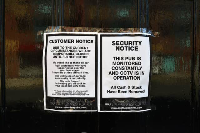 A notice on a door at The Borough pub, in Vine Place, Sunderland, during the ongoing pandemic.