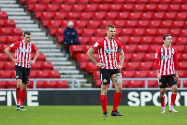 Dejected Sunderland players at the full-time whistle.