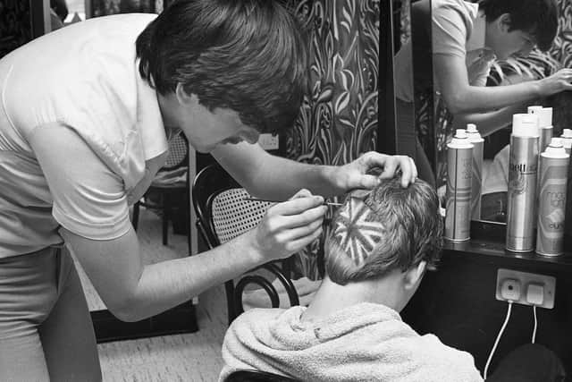 Shop assistant John Collins (17) spent four hours at the barbers while he had the Union Jack put on the back of his head in 1977.