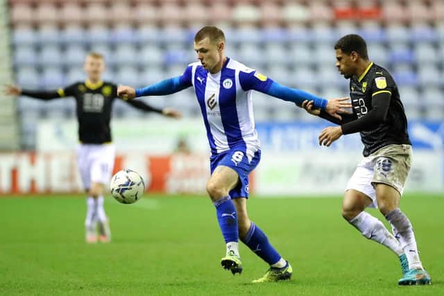 Max Power playing for Wigan Athletic.