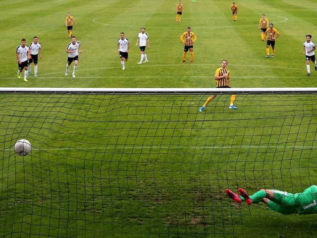 Peter Crook of Boston scores his sides first goal from the penalty spot during the Vanarama National League North Play-Off Semi-final match between Boston United and Gateshead.