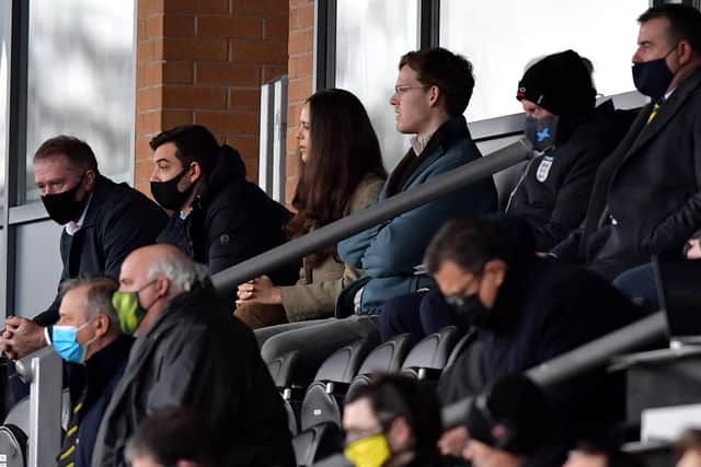 Sunderland's new owner Kiryl Louis-Dreyfus (top row, fourth from left) is pictured taking in the game.