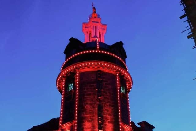 The Empire lit in red. Photo by Andrew Greenshields.