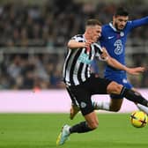 Sven Botman of Newcastle United is challenged by Armando Broja of Chelsea during the Premier League match between Newcastle United and Chelsea FC at St. James Park on November 12, 2022 in Newcastle upon Tyne, England. (Photo by Stu Forster/Getty Images)