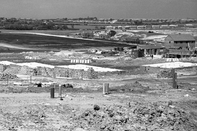 A view of Thorney Close showing houses under construction in 1947.