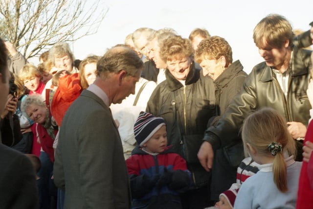 Prince Charles greets the crowd during his visit to Pennywell in 1998.
