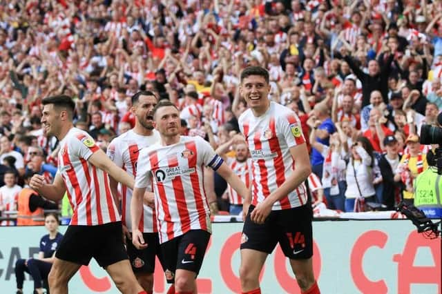 Sunderland players celebrate Ross Stewart's goal at Wembley Stadium.