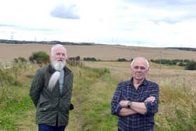Chair of Murton Parish Council Paul Penman, left and Murton resident Ron Winn and oppose the solar farm which will be built on the land behind them . Picture, Sunderland Echo.