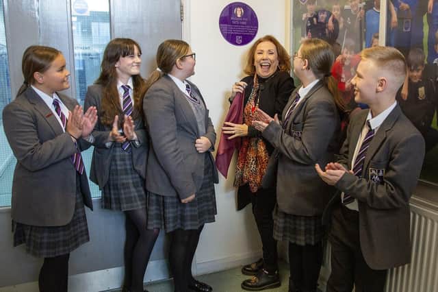 Coronation Street actor Melanie Hill shows her delight after unveiling her plaque.