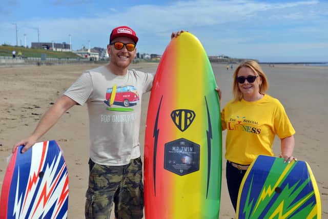 Bob Gnarly's Gary Wilson and Amy Howes from The Special Lioness ahead of a surfing social event at Seaburn Beach.