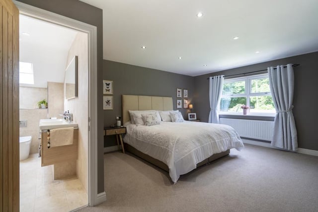 The bedroom has a double glazed window, recessed spot lighting and two radiators.