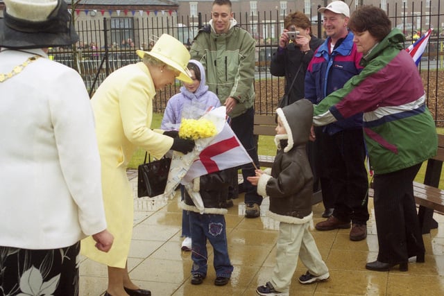 Queen Elizabeth II was pictured on a visit to the Easington Pit Disaster Garden in 2002.