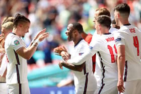 Raheem Sterling of England celebrates with Kalvin Phillips after scoring their side's first goal during the UEFA Euro 2020 Championship Group D match between England and Croatia at Wembley Stadium on June 13, 2021 in London, England.