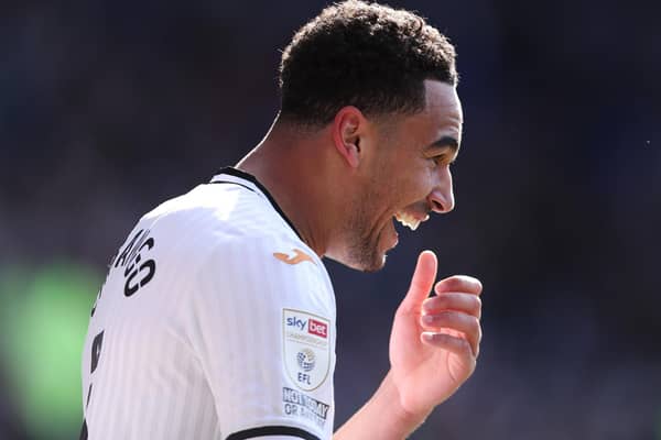 CARDIFF, WALES - APRIL 02: Ben Cabango of Swansea City celebrates scoring their side's second goal during the Sky Bet Championship match between Cardiff City and Swansea City at Cardiff City Stadium on April 02, 2022 in Cardiff, Wales. (Photo by Ryan Hiscott/Getty Images)