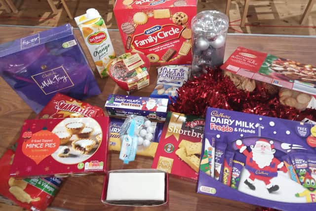 Some of the festive foods being provided to families in need.