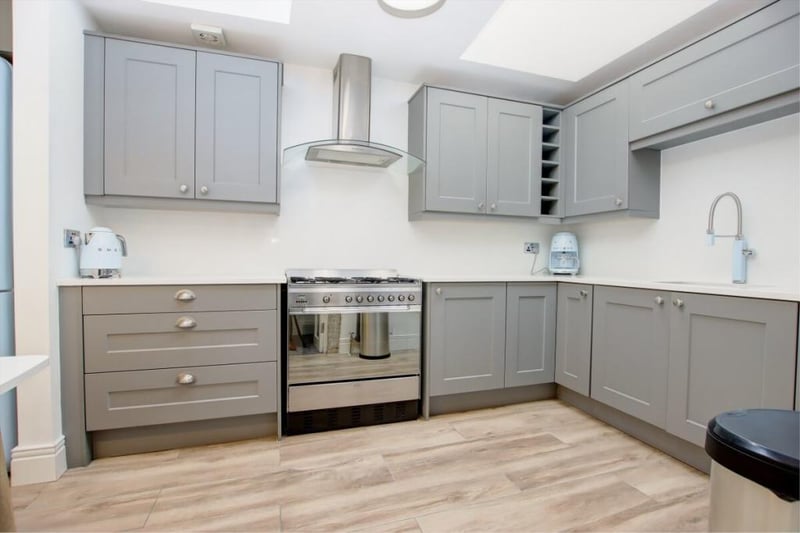 The newly-fitted kitchen offers lots of cupboard space and is flooded by light, with the high standards of fittings noted in the marketing details.