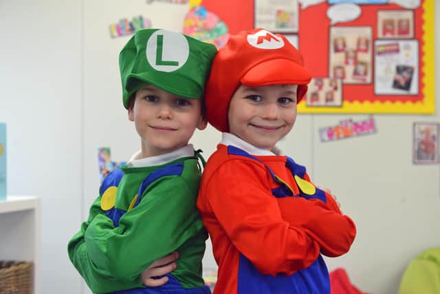 Twins Ollie and Mason Candlish, six, dressed as the Super Mario Brothers.
