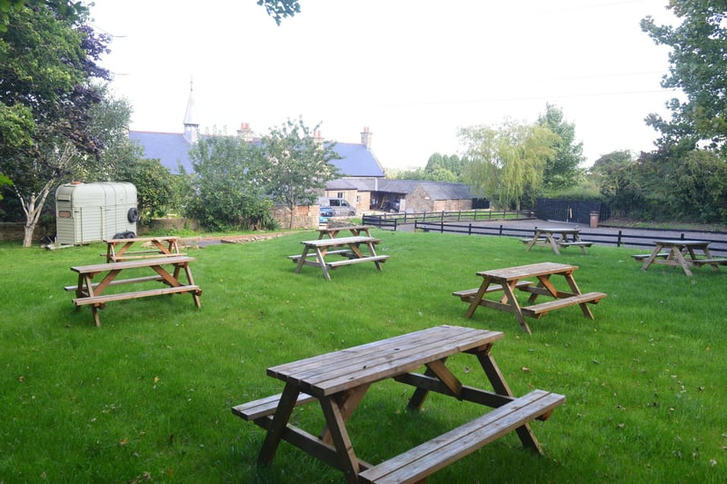 As well as seating in the main school room, there's courtyard seating as well as a grassed area seating. The site also has its own car park accessed at the bottom of the bank.