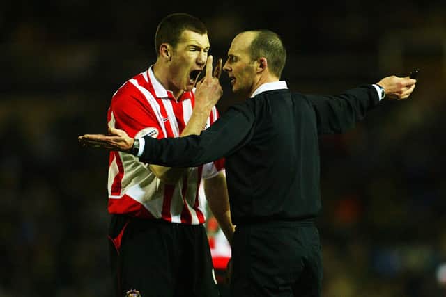 BIRMINGHAM, ENGLAND - FEBRUARY 25: Kevin Kyle of Sunderland makes his feelings known to referee Mike Dean during the FA Cup Fifth Round Replay match between Birmingham City and Sunderland at St. Andrew's on February 25, 2004 in Birmingham, England.  (Photo by Mark Thompson/Getty Images)