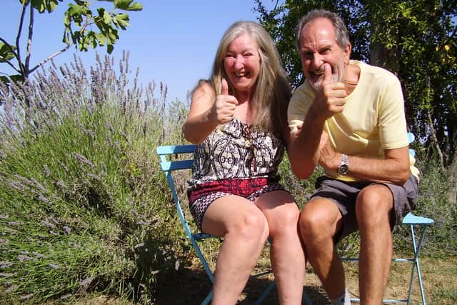 A thumbs-up for England from Greg and Sandra Perry in Italy.