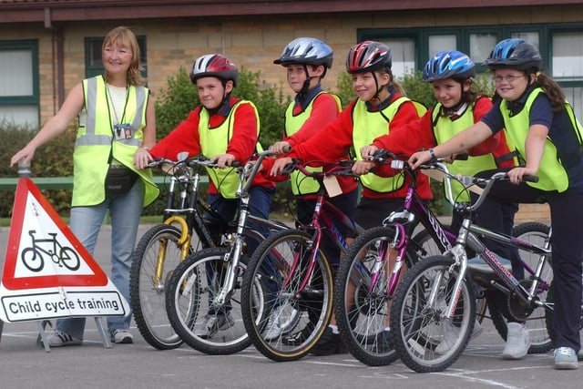 A 2003 scene and it shows cycling proficiency teaching at Redby Primary School. Remember this?