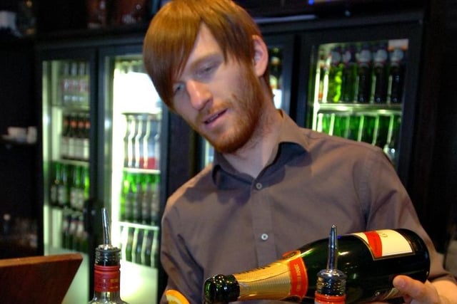 Assistant manager Declan Murphy pouring a jacuzzi champagne cocktail in 2010.