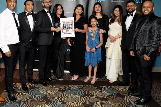 The team from My Delhi collecting a Special Recognition Award at the English Curry Awards