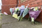 Flowers left by well wishers after the death of Terence Carney, 70, in Tees Street, Hartlepool.  Picture by FRANK REID