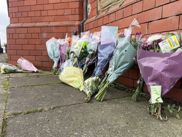 Flowers left by well wishers after the death of Terence Carney, 70, in Tees Street, Hartlepool.  Picture by FRANK REID