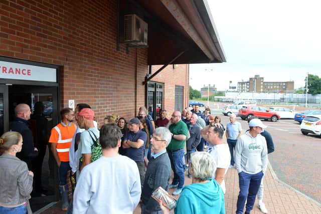 Fans queue outside the Stadium of Light ticket office