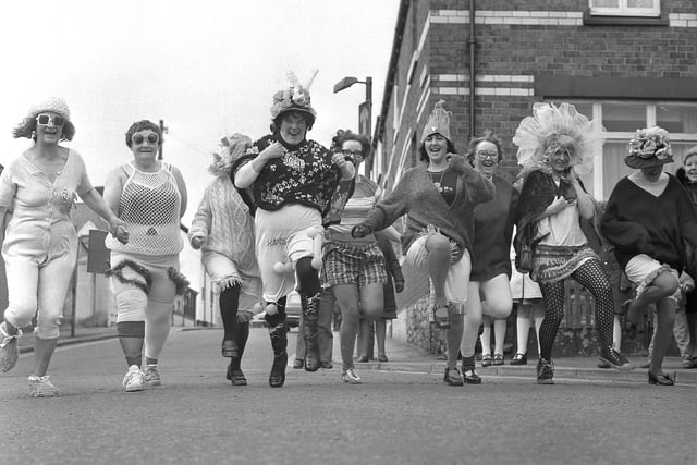Bonnets at the ready! Geraldine Barrow, centre, landlady of the Grey Horse at Whitburn. She's pictured with Anita McGurrell, left, and Barbara McKie, right, and others who were taking part in the Easter bonnet contest on April 1, 1975.