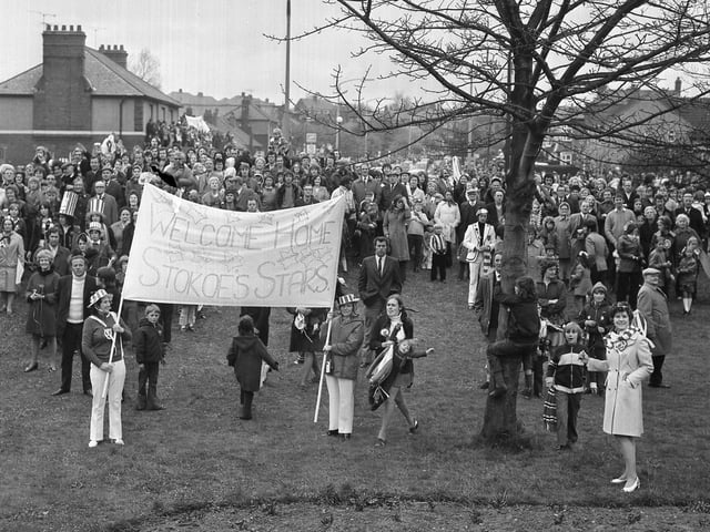 Banners to welcome the heroes home as the bus nears the town centre.