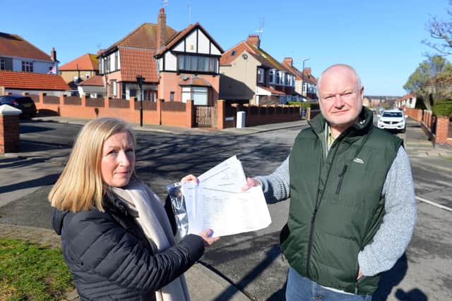 Local resident Tracey Ward hands over a petition to Cllr Michael Hartnack over the proposed junction closure on Princess Avenue from Sea Lane, Seaburn.