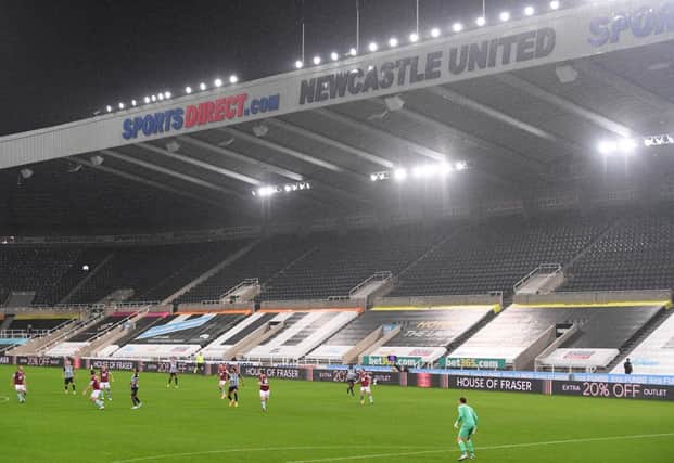 A general view of the action played out in torrential rain during the Premier League match between Newcastle United and Burnley at St. James Park on October 03, 2020 in Newcastle upon Tyne, England. Sporting stadiums around the UK remain under strict restrictions due to the Coronavirus Pandemic as Government social distancing laws prohibit fans inside venues resulting in games being played behind closed doors.