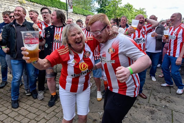 Fans celebrate as Elliot Embleton gives Sunderland the lead.