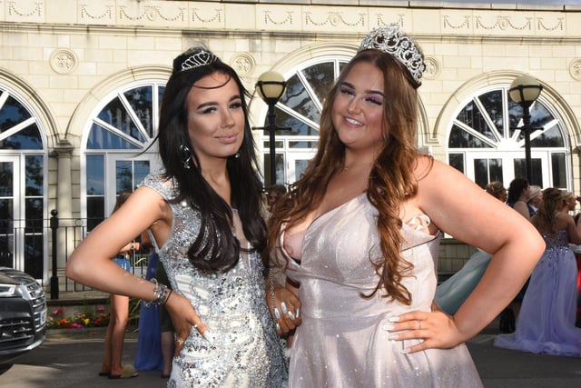 Two Year 11 girls wearing tiaras to match their prom outfits.