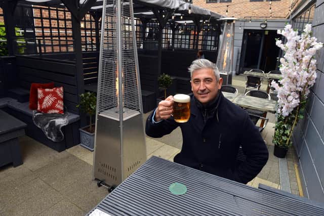 The new Court Yard outdoor space at The Looking Glass with owner Harry Collinson.