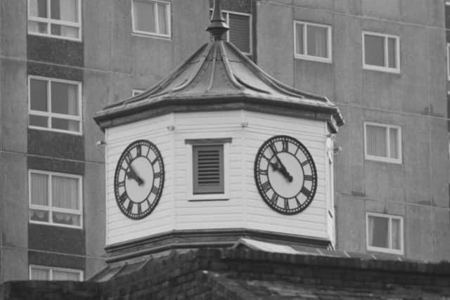 The four-sided clock on The Exchange Building.