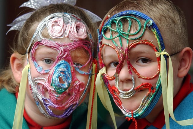 Connie Bunn and Adam Watson wore their string masks a part of a celebration of Mexican culture in 2004.