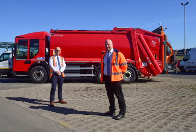 Peter Metcalfe, left, Fleet Management & Compliance Manager and Ian Bell, Fleet Manager, with Sunderland City Council's new Electric Refuse Collection Vehicle.