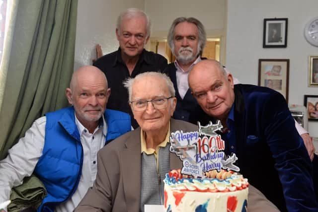 Harry Oxman celebrates his 100th birthday with his sons from left Brian, Ken, Peter and Keith.